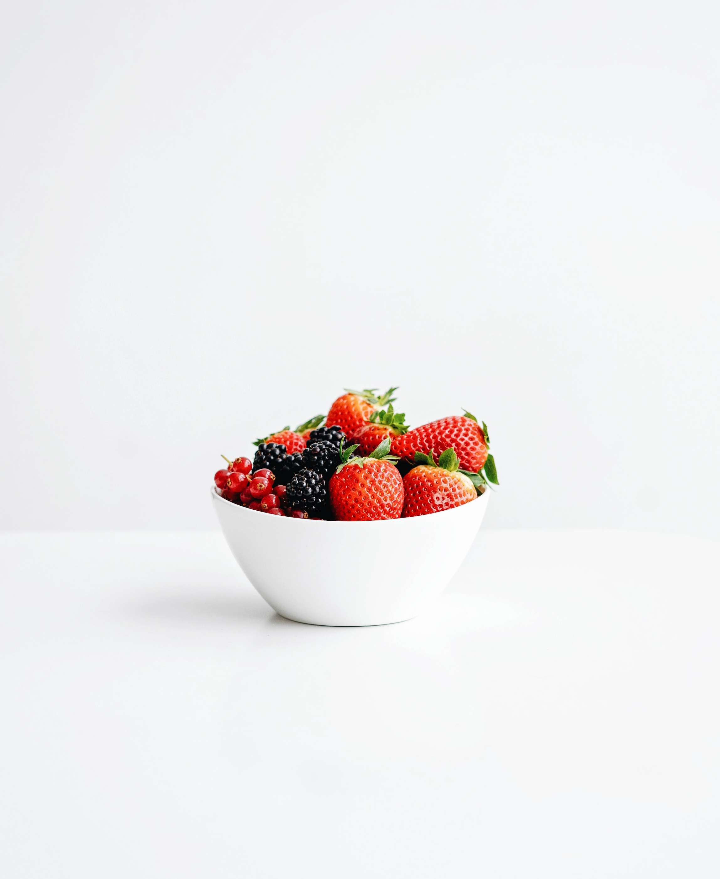 white-background-bowl-of-berries-nutrition-promo